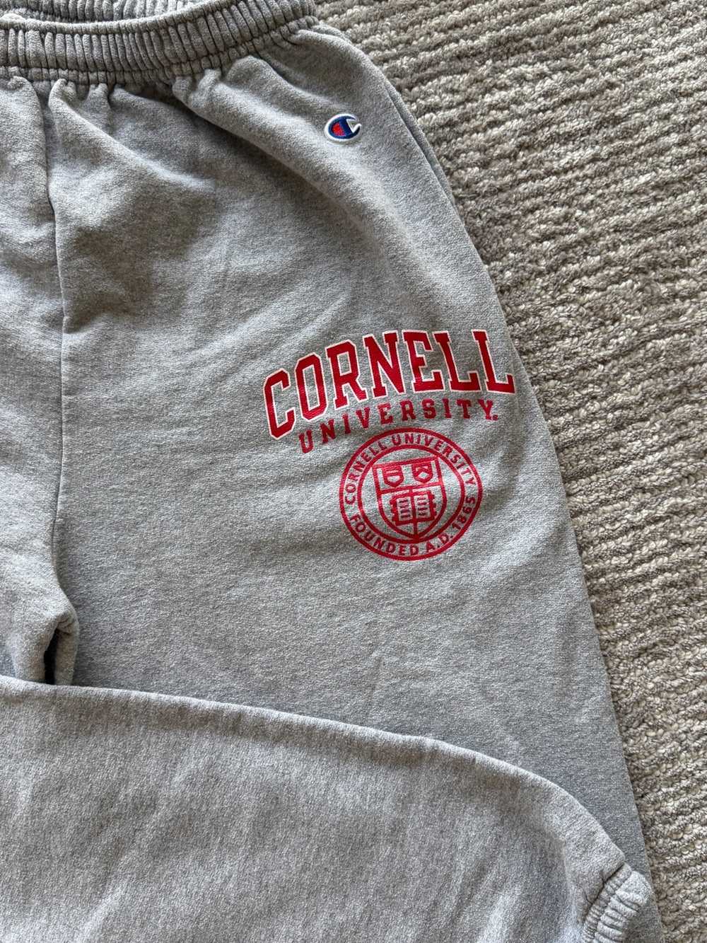 Champion Gray Sweatpants with White Drawstring and Logo
